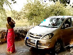 Indian bhabhi gives a sensual car wash, stripping and having sex in the back.