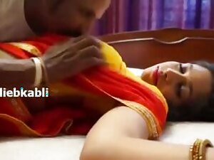 Seductive Indian auntie in a playroom filled with sex toys experiences intense orgasms during her erotic encounter.