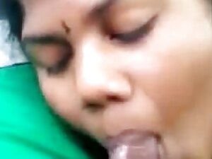 An Indian MILF eagerly swallows a load, showcasing her insatiable appetite for cum.