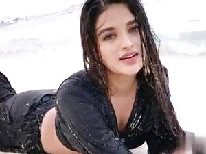 Seductive Nidhhi Agerwal heats up the room, her passion palpable.