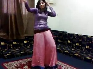 Seductive Pakistani beauty dances sensually, revealing her tantalizing curves.