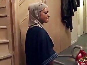 A hijabi aunty's tight ass gets pounded hard in a steamy interfaith encounter, captured in explicit images.